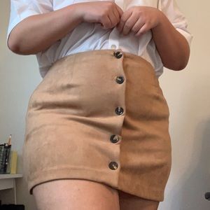 Tan colored button-up skirt